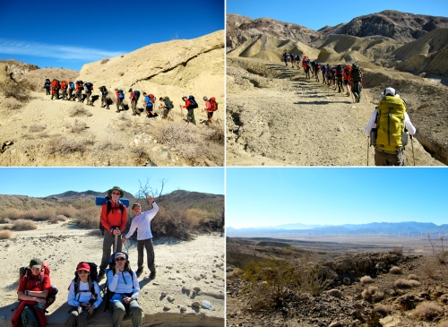 A line of hikers heading into the desert.